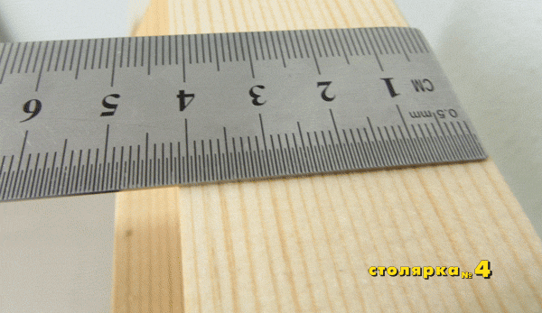 Линейкой показана толщина коробки блока, которая составляет 42 мм. Если взять ширину с наплывом рамы то она составит 54 мм. 