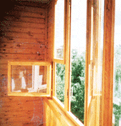 Деревянное остекление балконов с обшивкой вагонкой
